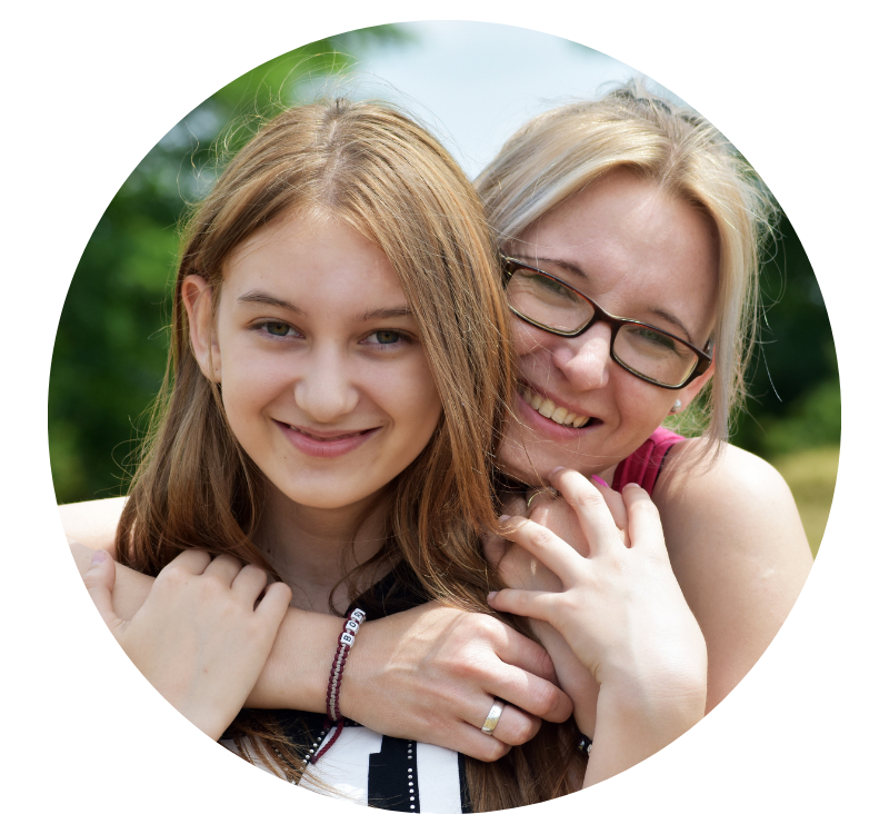 Mother and daughter hugging