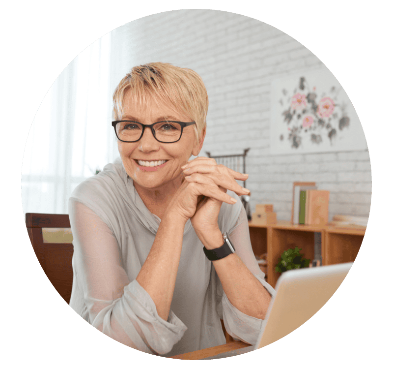 Woman at computer smiling